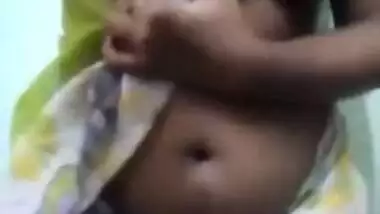 Aroused Indian porn model exposes XXX charms without taking sari off