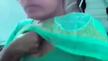 Horny Indian female un green helps man relax touching her XXX boobs