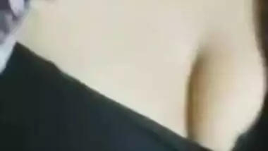 Desi woman in floral robe teases lover demonstrating big breasts