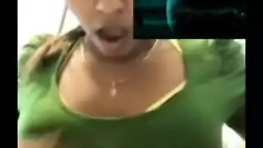 Indian temptress films XXX titties on her own and rubs nipples