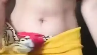 Indian girl takes colorful clothes off to bare hairy pussy for some porn